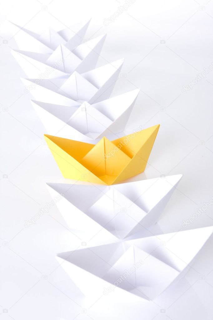 Winning yellow paper boat origami
