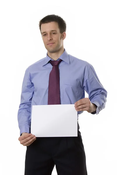 Homem de negócios segurando papel em branco — Fotografia de Stock