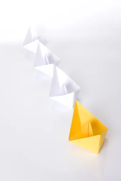 Yellow paper boat — Stock Photo, Image