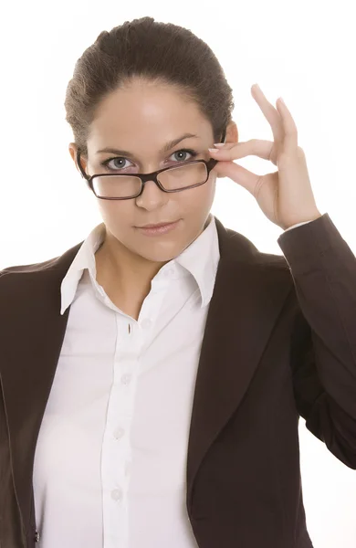 Mulher olhando sobre o topo de seu glasse — Fotografia de Stock