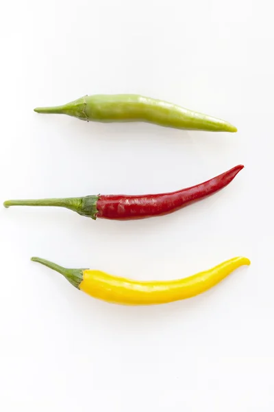 Zielony, czerwony i żółty hot chili peppers — Zdjęcie stockowe