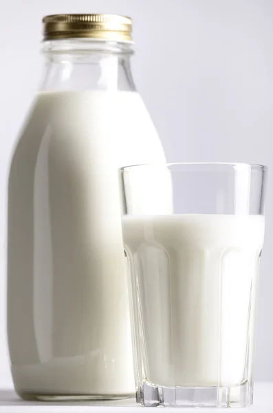 Glass and Bottle of fresh milk — Stock Photo, Image