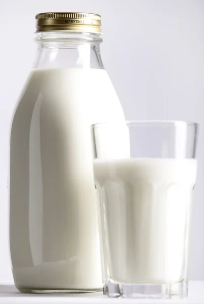 Glass and Bottle of fresh milk — Stock Photo, Image