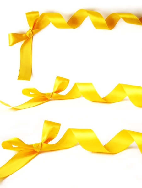 Yellow ribbons with bow for decoration — Stock Photo, Image