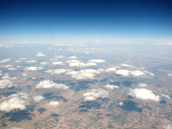 Clouds above horizon