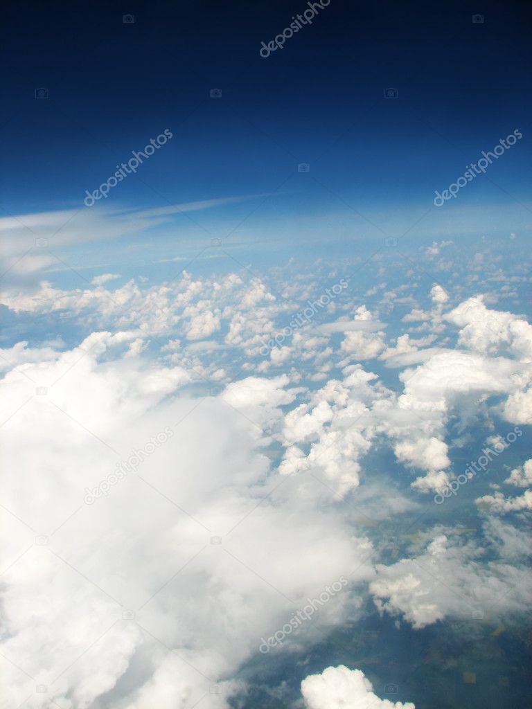Clouds above horizon