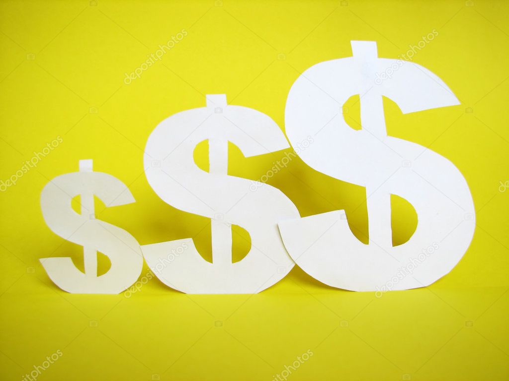 Us dollar sign cut from paper