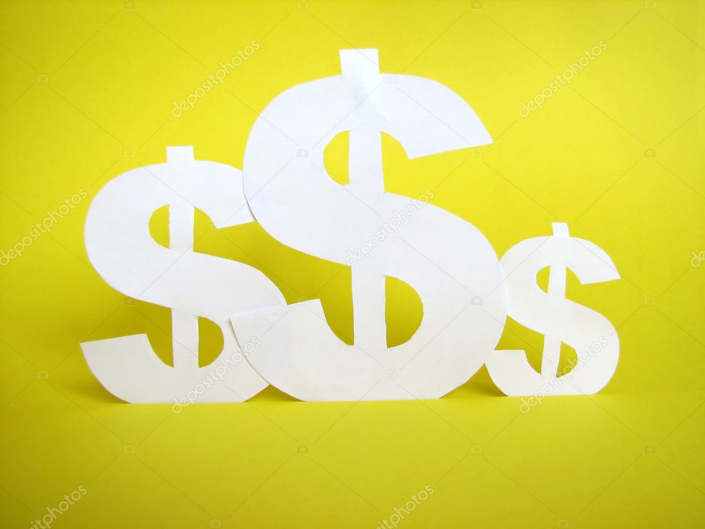 Us dollar sign cut from paper