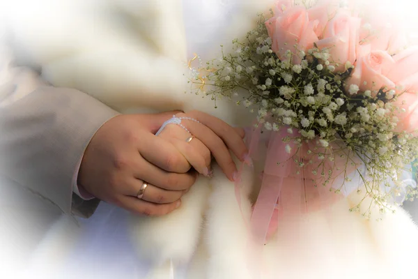 Bride and Groom holding hands in the han — Stock Photo, Image
