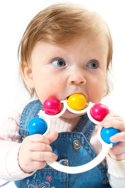 Criança em terno de calça com brinquedo — Fotografia de Stock