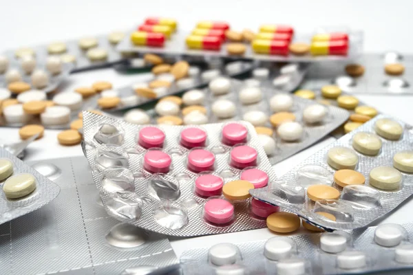 Lot of pills at the packages — Stock Photo, Image