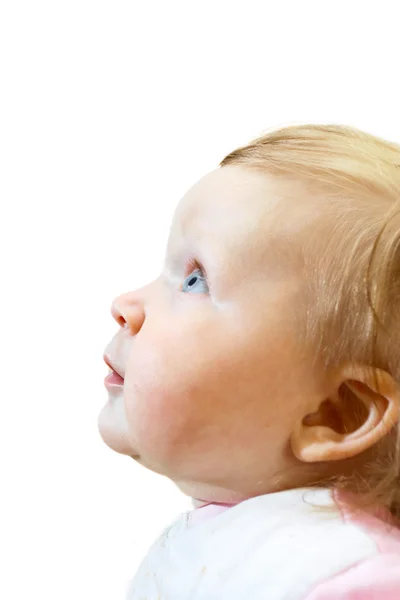 Porträtt av en baby som tittar upp — Stockfoto