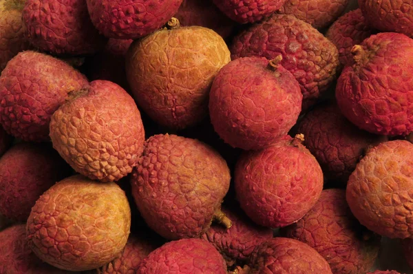 Çin lychee meyve fındık yığını — Stok fotoğraf