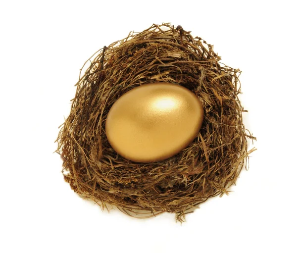 Золоте гніздо яйце над головою — стокове фото
