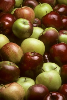 Pile of mixed varieties of apples clipart