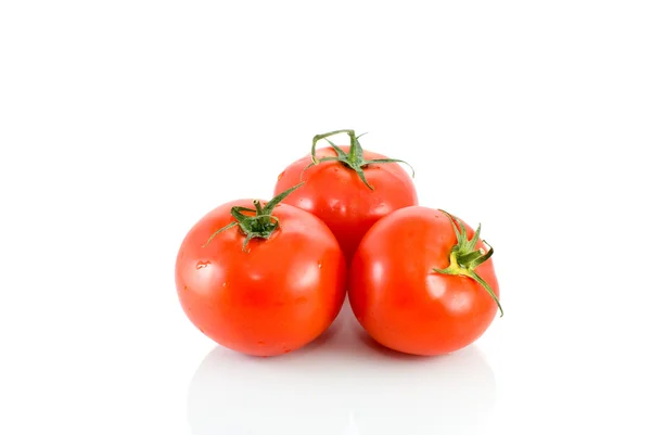 Tre mogna röda tomater — Stockfoto