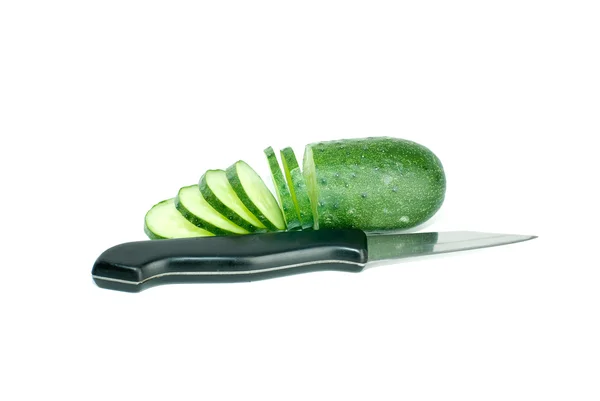 Sliced cucumber and the knife — Stock Photo, Image