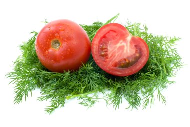 Whole and half of tomato over some dill clipart