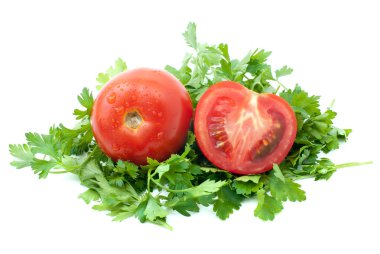 Tomatoes and half with some parsley clipart