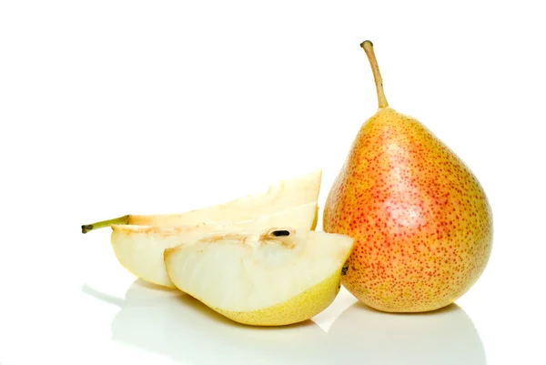Whole yellow-red pear and few slices — Stock Photo, Image