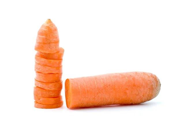 La moitié de la carotte et quelques tranches — Photo