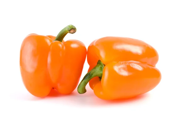 Pair of orange bell peppers — Stock Photo, Image