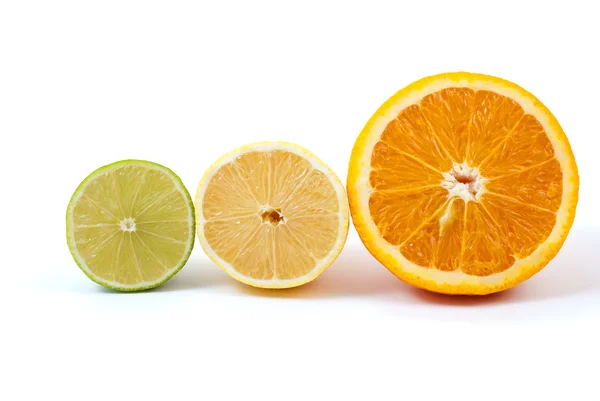 Halves of orange, lemon and lime — Stock Photo, Image