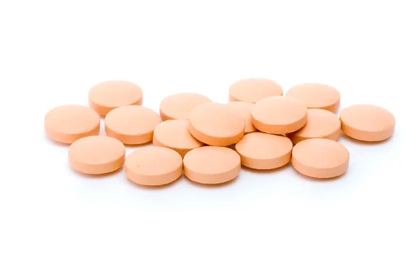 Einige orangefarbene Tabletten — Stockfoto