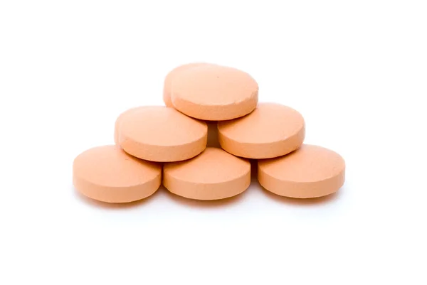 Wenige orangefarbene Tabletten — Stockfoto