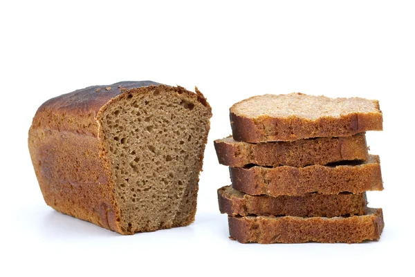 Chunk and slices of rye bread — Stock Photo, Image