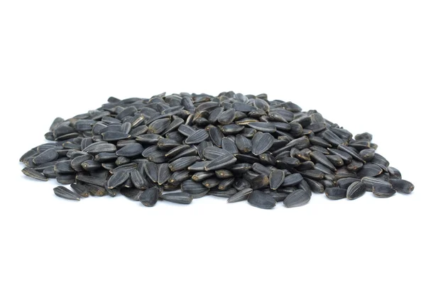 Algumas sementes de girassol preto — Fotografia de Stock