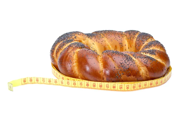 Fancy loaf and measurement tape — Stock Photo, Image