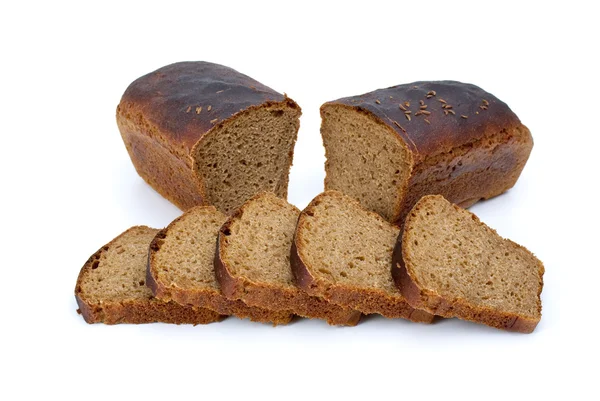 Two halves of rye bread and some slices — Stock Photo, Image