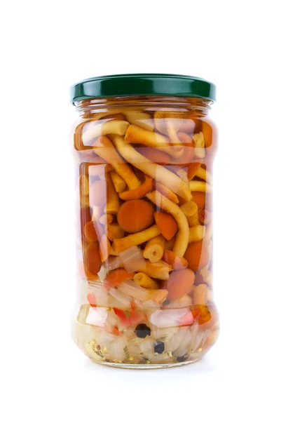 Glass jar with marinated honey agarics — Stock Photo, Image