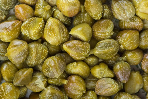Marinated capers background — Stock Photo, Image