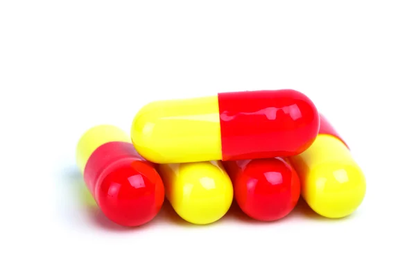 Some yellow-red capsules — Stock Photo, Image