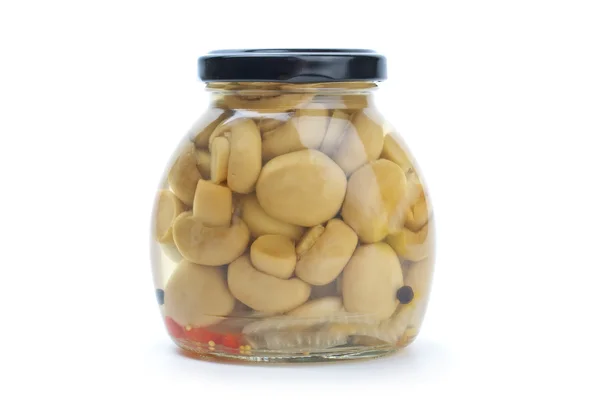 Glass jar with marinated champignons — Stock Photo, Image