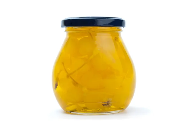 Glass jar with yellow cocktail cherries — Stock Photo, Image