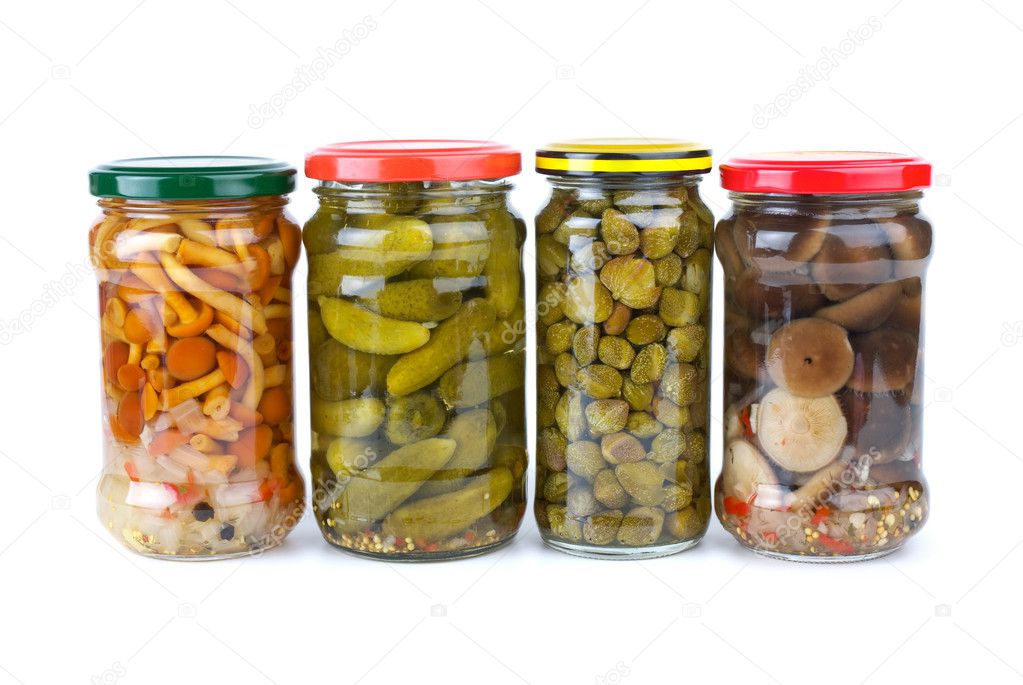 Glass jars with marinated vegetables