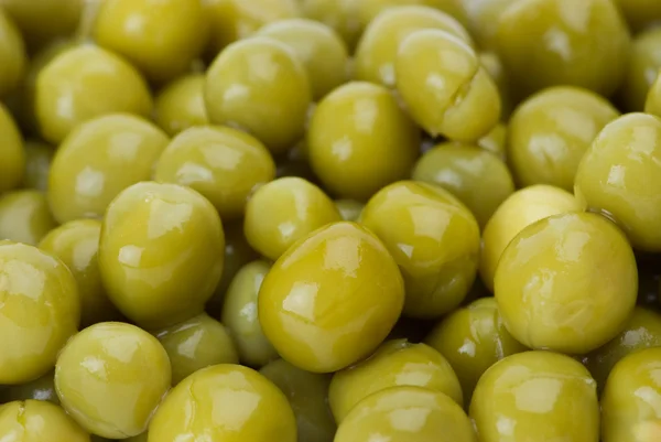 Background of conserved green peas — Stock Photo, Image