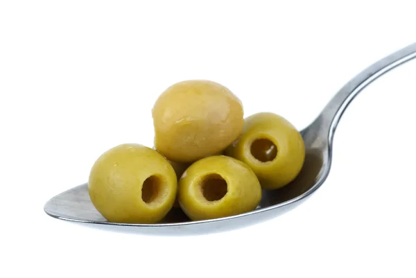 Olives in the metal spoon — Stock Photo, Image
