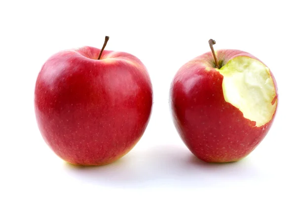 Celá a pokousal jablka — Stock fotografie