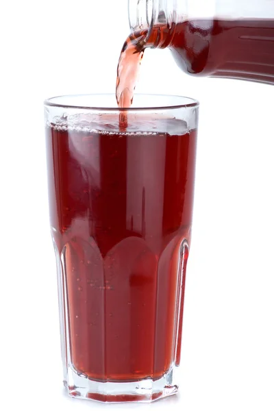 Bicchiere versato con succo di melograno — Foto Stock