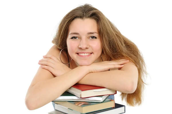 Młoda dziewczyna z długimi włosami i książki — Zdjęcie stockowe