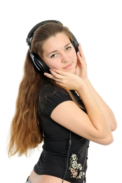 Beautiful young woman in the headphones — Stock Photo, Image