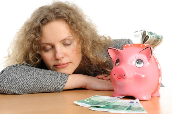 Zakenvrouw met een piggy bank — Stockfoto
