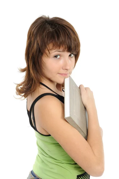 Girl the teenager with the book smiles — Stock Photo, Image