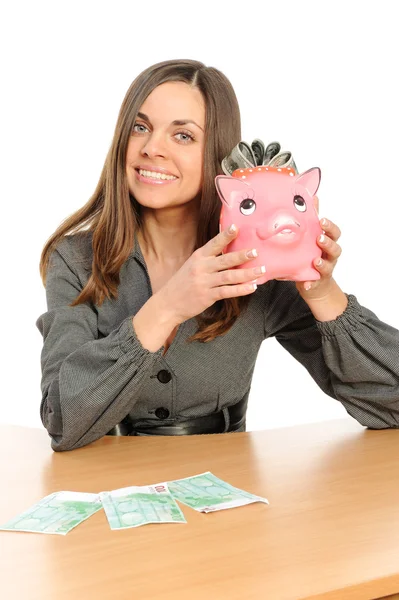 Geschäftsfrau mit Sparschwein — Stockfoto