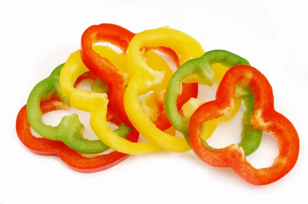 In Scheiben geschnittene bunte Paprika — Stockfoto