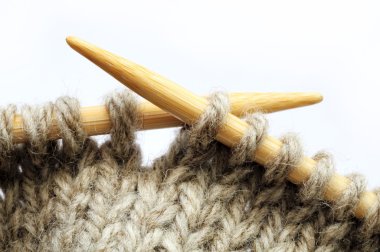 Knitting with bamboo needles clipart